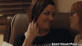 Redhead Penny Pax sat on the smooth face of Sovereign Syre in a wild tribbing session