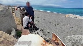 Stocking-clad teacher gives risky beachside blowjob