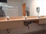 zentai snake showing cock in public bathroom
