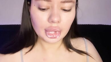 Big lips swallow every drop while moaning soft and wet