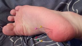 Foot punishment with needles