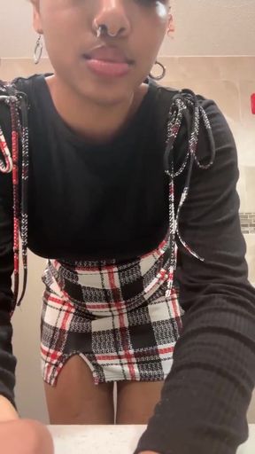 Teen girl twerks in public bathroom stall