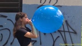 Katie Blows to Pop a Blue 16" Punchball