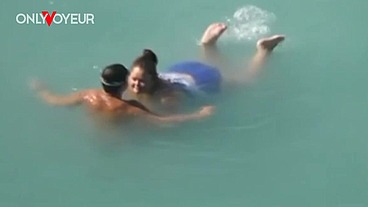 Beach Voyeur. BBW girl fucked in the coastal waves