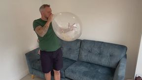 JL blowing up massive confetti balloons - non pop.
