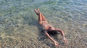 naked nudist woman swim at nudist beach#naked sun tanning