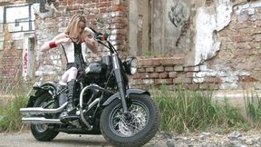 Skinny blonde on a bike