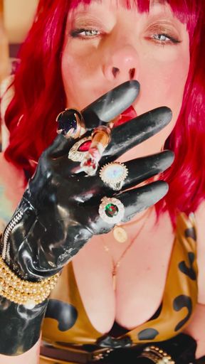 The Beautiful Rubber Beauty Tina Snua Smoking A Cigarette Using A Holder - Smoker Latex Gloves Rings Jewellery   Clip 1
