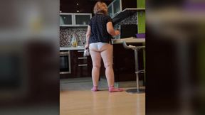 Mature housewife BBW MILF in the kitchen in white panties.