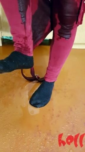 Cutie soak her red denim jumpsuit and splashing in the puddle