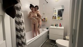 Hazel-eyed vixens make love in the bathroom