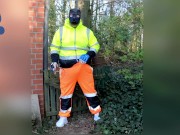 quick pawing off in hi-vis tracksuit and sneakers outdoors