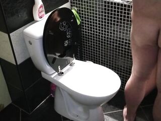 Wife sucks wang whilst I pee on the throne-room