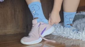 Jessie has difficulty getting her feet into her shoes