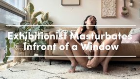 Exhibitionist masturbates in front of street facing window