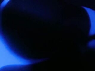 Crossdresser below UV light