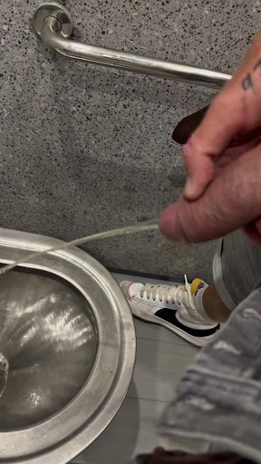 Jerking and Pissing on a Motorway Rest Area