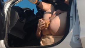 Car, sun and dildo