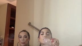 Bimbos smoking in bikini in the hottub and playing with bubble wand