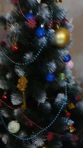 We met on Tinder. A mature woman and a teenager are decorating a Christmas tree on their first date.   Clip 2