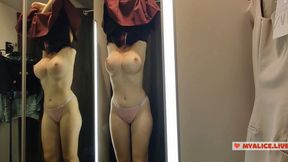 Sultry seduction unfolds in a cramped, transparent dressing room with MycandyAlice, a brazen beauty flaunting her flesh.