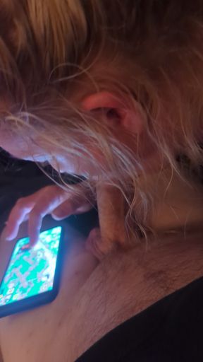 Wife sucking cock while playing on her phone   Clip 1
