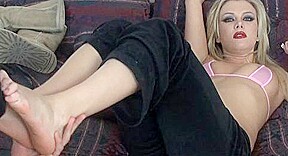 Busty blonde wants her toes sucked