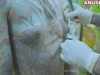 Tattoo model Anuskatzz gets teat piercings during the time that anal screw hardcore bizarre coarse sex SADOMASOCHISM fetish