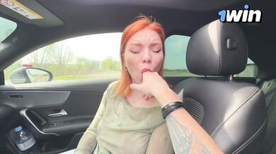 Red head chokes on thick cock in car and swallows every drop