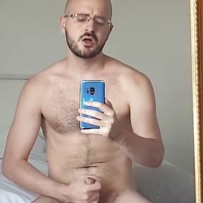 Jerking in front of the mirror