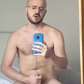 Jerking in front of the mirror