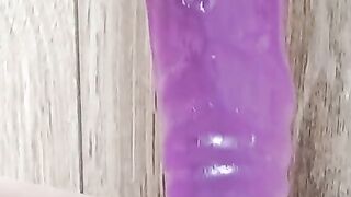 Cunt masturbating with purple cock