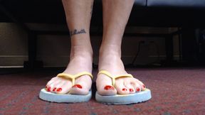 Toe wiggling in flipflops closeup