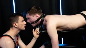 Handcuffed twink probed at both ends by a muscled top
