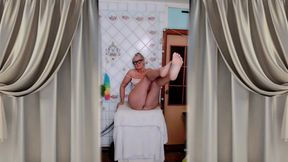 Lukerya is flirting in the kitchen at home.