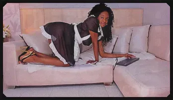 Seductive Ebony Maid Teases in Lingerie & Heels