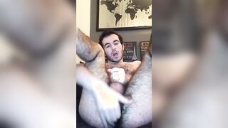 Fingering his hairy ass hole