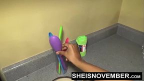 Petite ebony whore gives a kneeling blowjob to a big cock