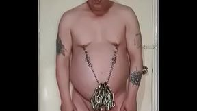 Chastity Cage and man boob stretching with heavy chains with 3 voting down wankers