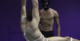 Twink is tied up by a masked man and gets used for fun