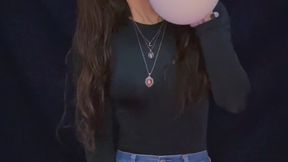 Empress Scarlett blows and pops balloons