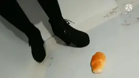 Slender Japanese crushes your boots and shows off her feet