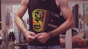 Strong tall guy Destroying a vintage Tape Record Player