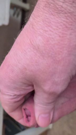My Friend Sits in a Chair and Jerks His Cock While Watching the Video Until He Orgasms