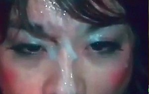 Asian CD sucking cock