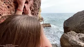 Amigo fucked the climber in the mouth and pussy right on the edge of the cliff