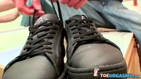 Handsome Clyde takes off his shoes to worship his foot before masturbating
