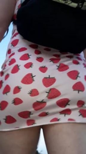 Crossdresser walks through the forest