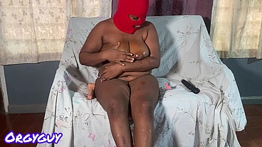 Ebony madams masturbates with a magic wand vibrator