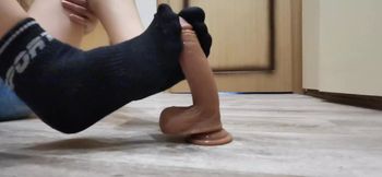 Footjob in black socks